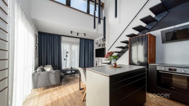 Prodej loftového bytu 1+kk s balkonem a možným sklepem a GS – Bydlení na Krejcárku, Praha 9.