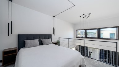 Prodej loftového bytu 1+kk s balkonem a možným sklepem a GS – Bydlení na Krejcárku, Praha 9.