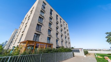 Prodej loftového bytu 1+kk s balkonem a možným sklepem a GS – Bydlení na Krejcárku, Praha 9.