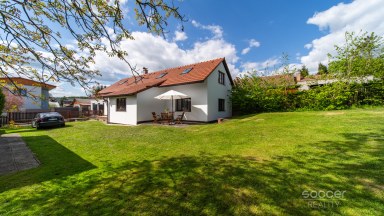 Malebný dům s příjemnou zahradou v atraktivní lokalitě.